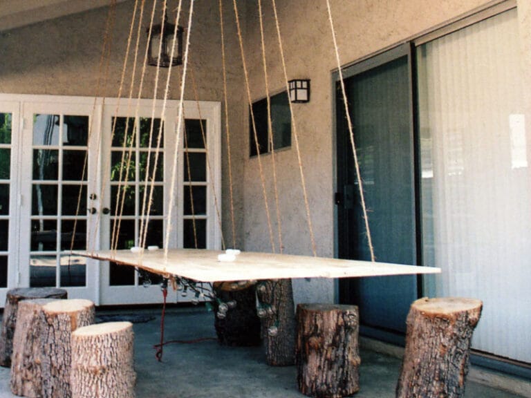 Terraza de estilo rústico. Mesa colgante Terraza de estilo rústico. Mesa colgante